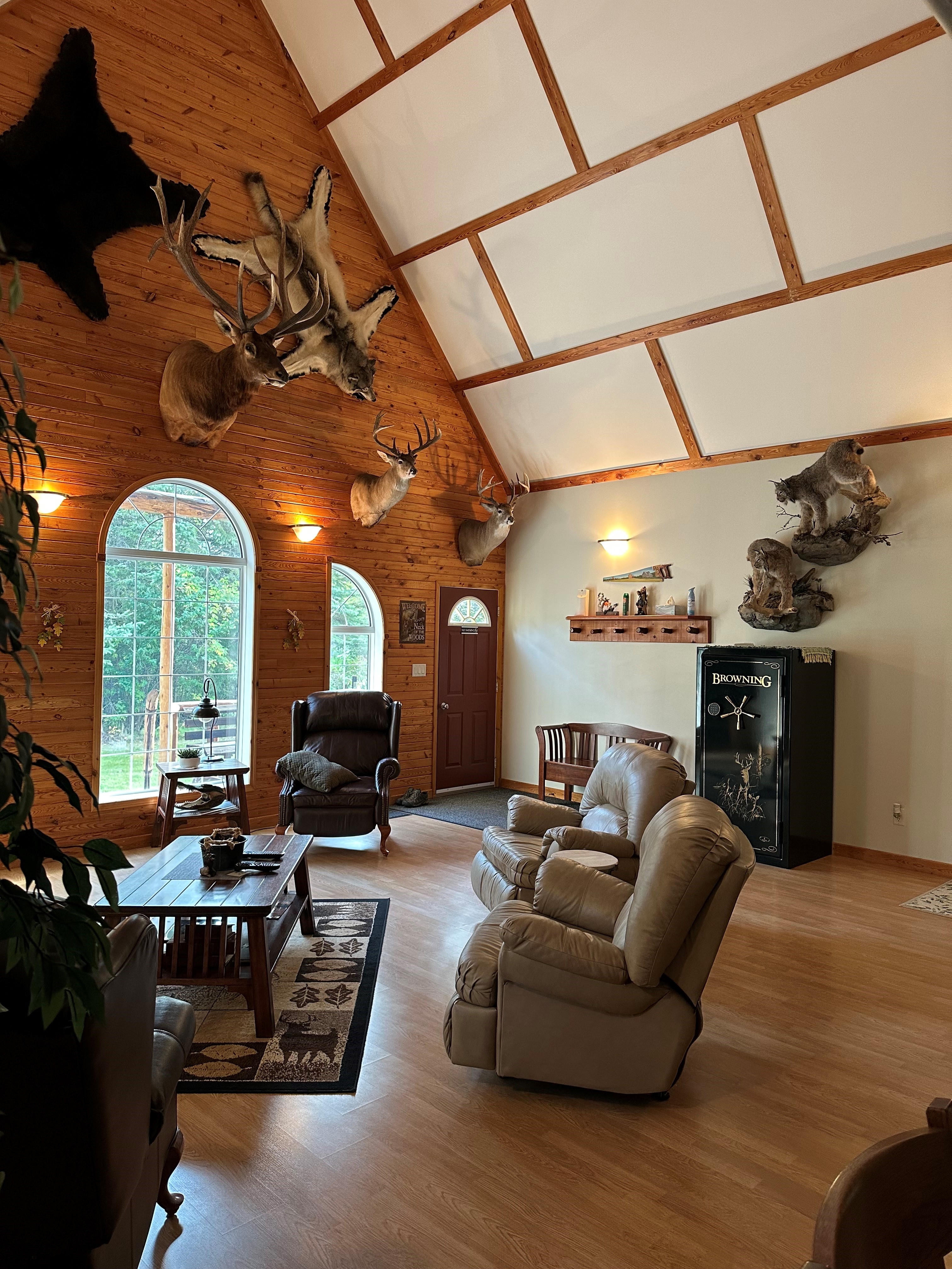 Interior seating and trophy displays inside the lodge