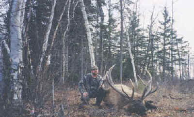 Spencer Patterson from Georgia with trophy bull elk at Echo Lake Hunts in Saskatchewan