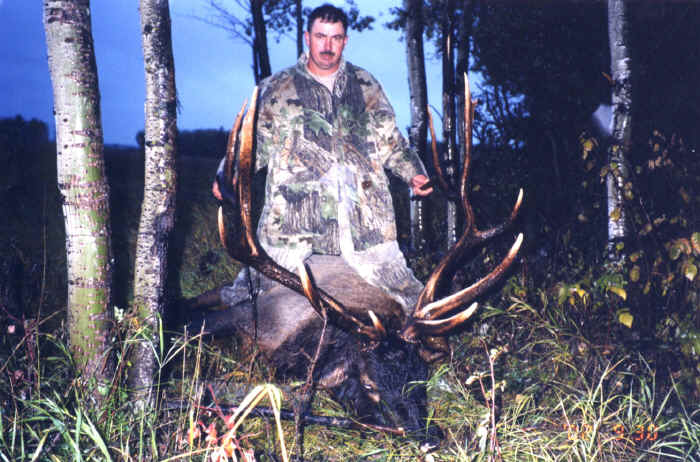 Albert Simmons from Texas with trophy bull elk at Echo Lake Hunts in Saskatchewan