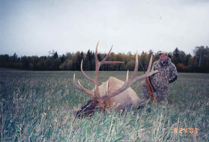 Chris Mellen from Texas with trophy bull elk at Echo Lake Hunts in Saskatchewan