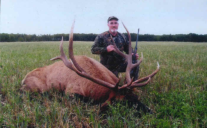 Doug Whitaker from Indiana with trophy elk at Echo Lake Hunts in Saskatchewan