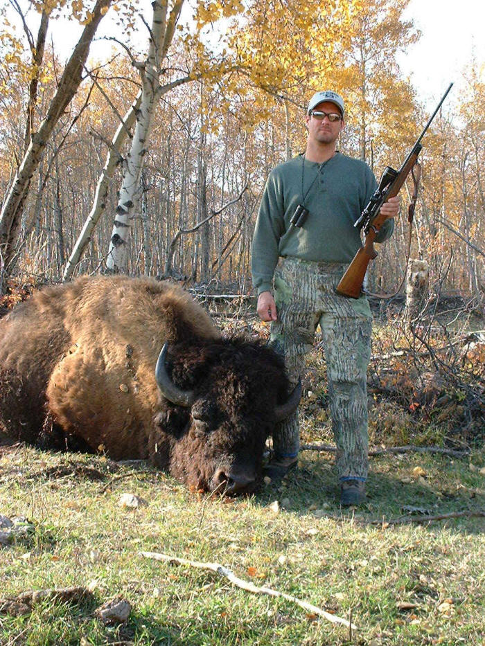 Ed Kruse from Texas with trophy bison at Echo Lake Hunts in Saskatchewan