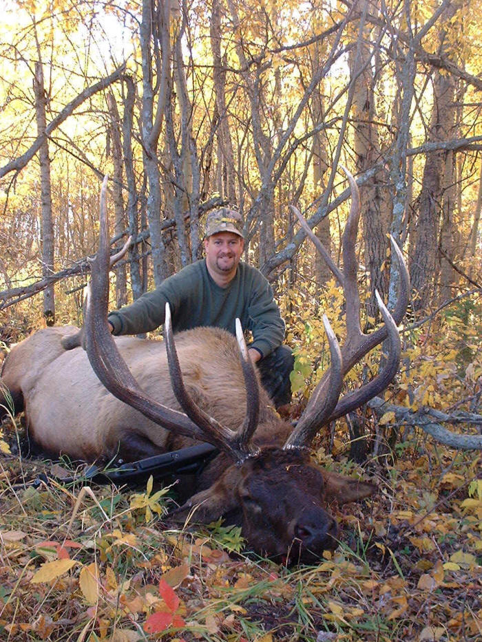 Eric Robertson from Texas with trophy elk at Echo Lake Hunts in Saskatchewan