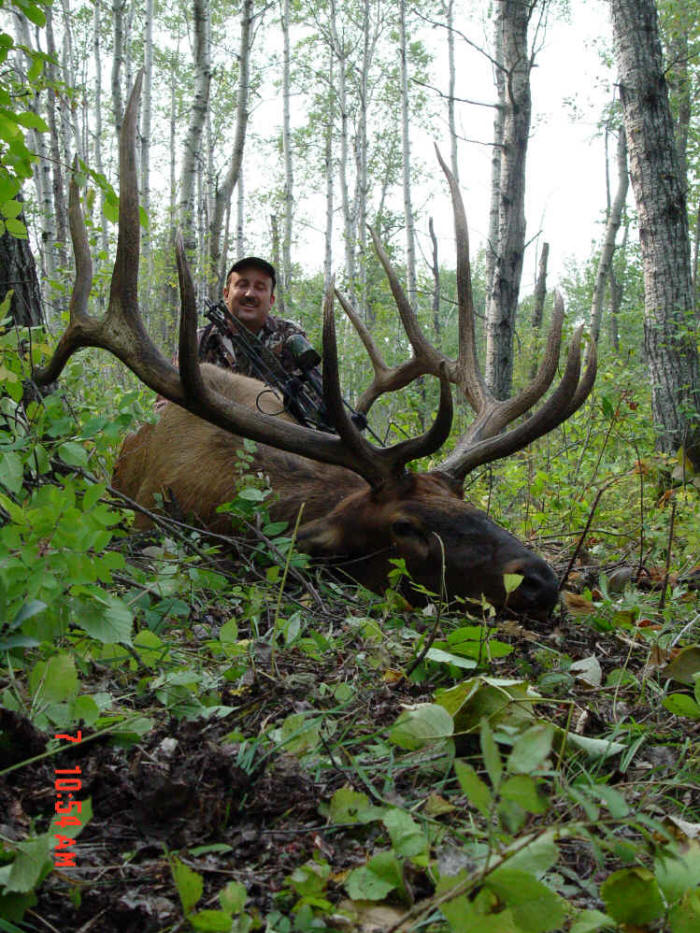 George Tunal with trophy elk at Echo Lake Hunts in Saskatchewan