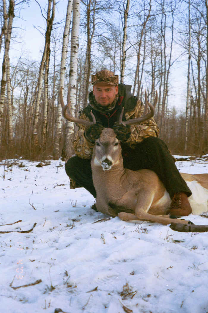 Keith Wood from North Carolina with trophy whitetail at Echo Lake Hunts in Saskatchewan