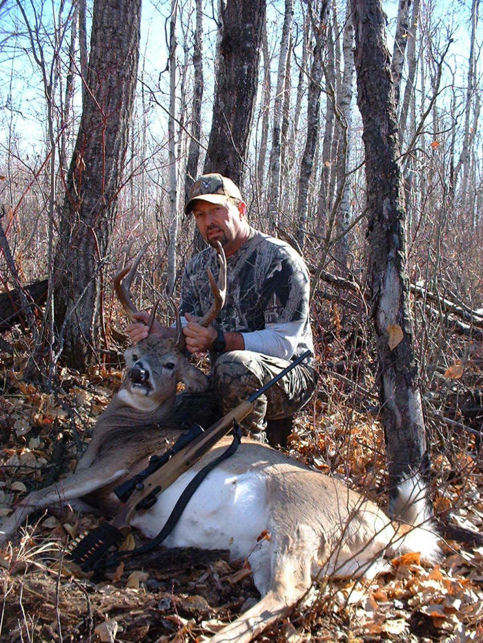 Larry Zuntych from Texas with trophy whitetail at Echo Lake Hunts in Saskatchewan