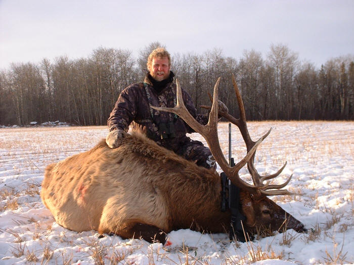 Whitey Forster from Texas with trophy elk at Echo Lake Hunts in Saskatchewan