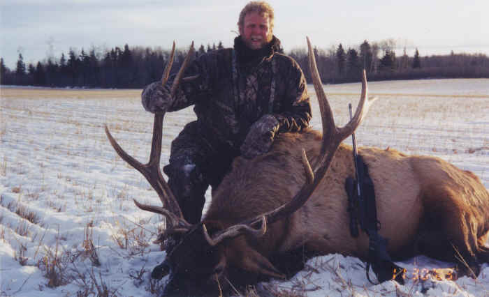 Whitey Forster from Texas with trophy elk at Echo Lake Hunts in Saskatchewan