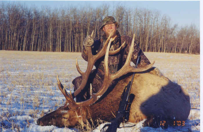 Whitey Forster from Texas with trophy elk at Echo Lake Hunts in Saskatchewan