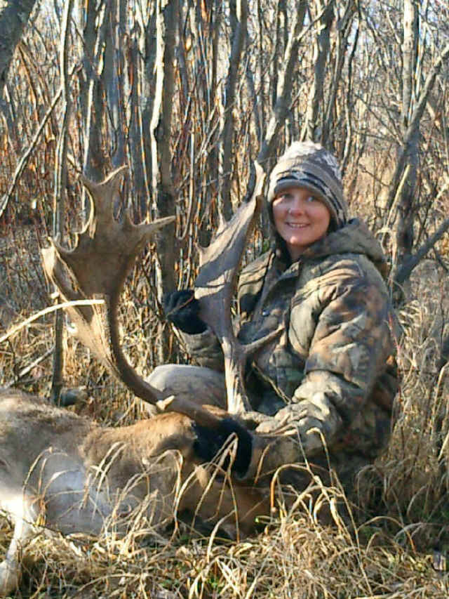 Diana Herrin from Arizona with trophy reindeer at Echo Lake Hunts in Saskatchewan