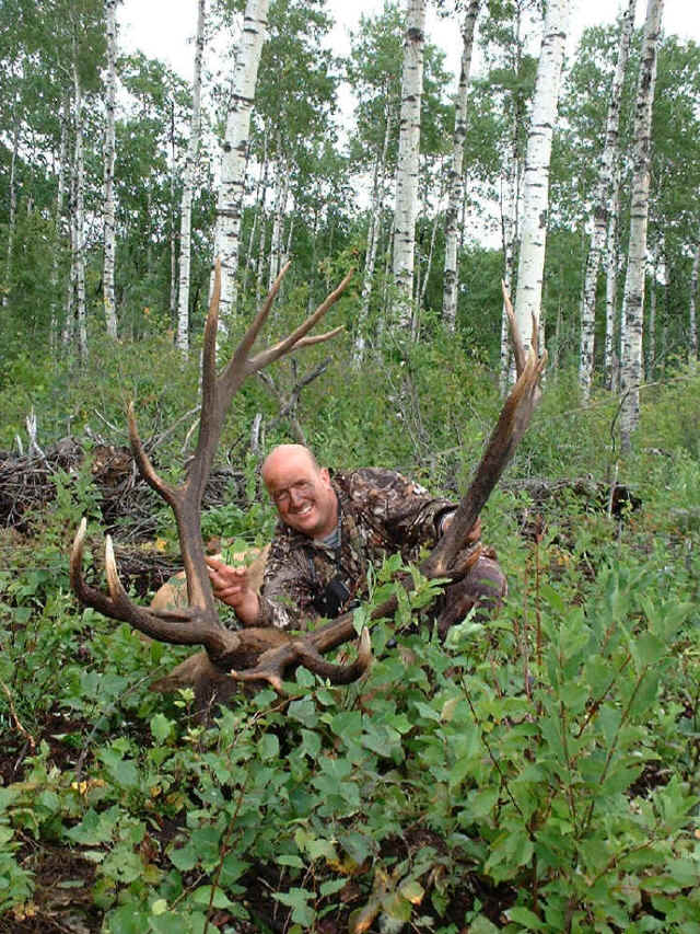 George Tunal from Texas with trophy elk at Echo Lake Hunts in Saskatchewan