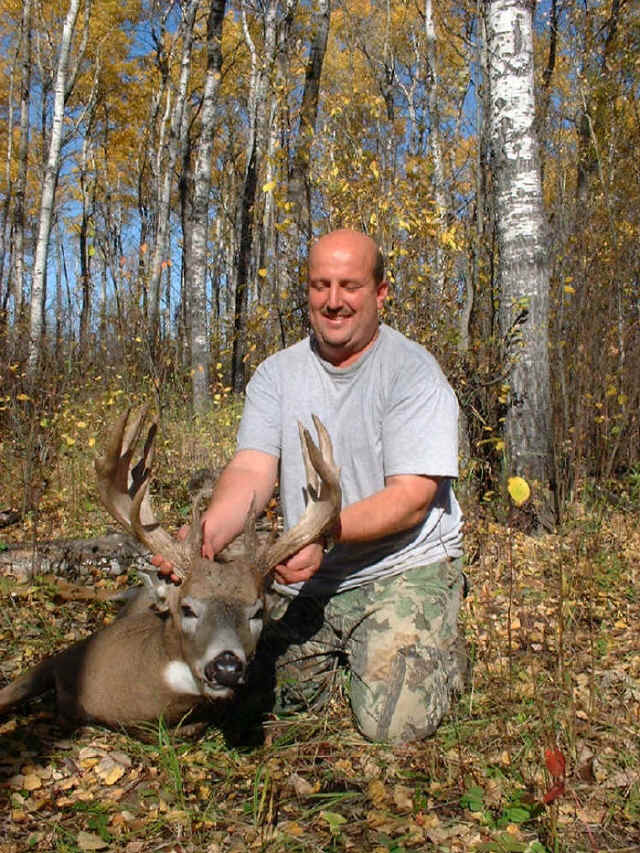 George Tunal from Texas with trophy whitetail at Echo Lake Hunts in Saskatchewan