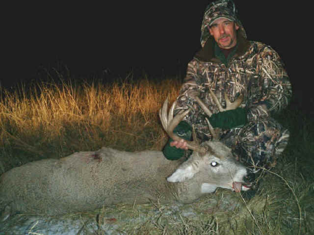 Jim Rust from Missouri with trophy whitetail at Echo Lake Hunts in Saskatchewan