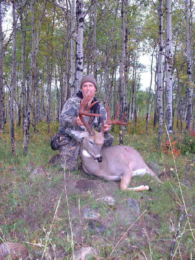 Kirk Templin from Texas with trophy whitetail at Echo Lake Hunts in Saskatchewan