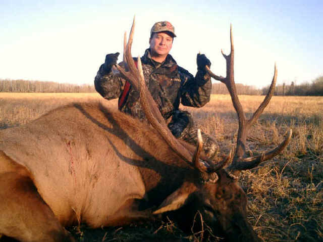 Lorenzo Perea from Texas with trophy elk at Echo Lake Hunts in Saskatchewan