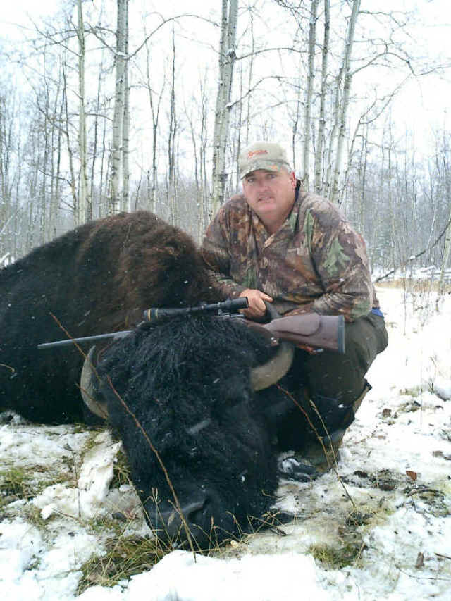 Mike Inscore from Texas with trophy bison at Echo Lake Hunts in Saskatchewan