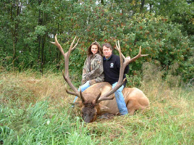 Tom and Caleb with a trophy elk