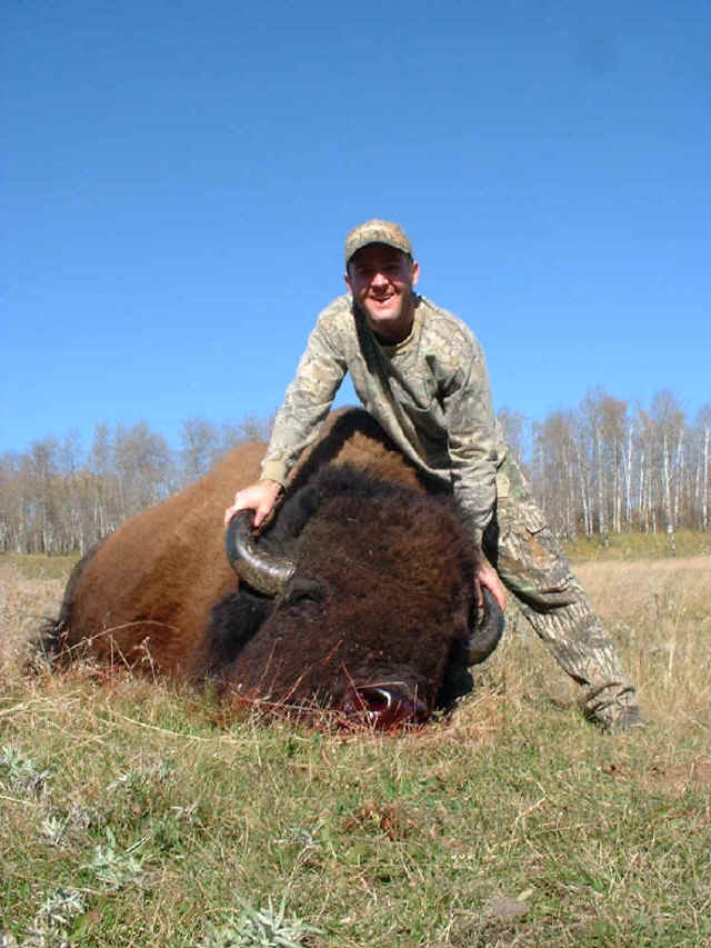 Randy McMullen from Texas with trophy bison at Echo Lake Hunts in Saskatchewan