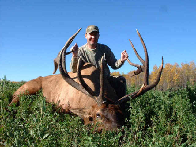 Randy McMullen from Texas with trophy elk at Echo Lake Hunts in Saskatchewan