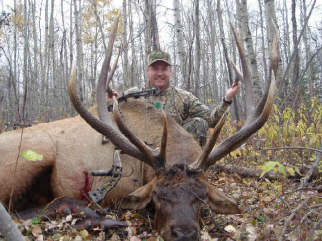 Ronnie Gilbert Jr. from Texas with trophy elk at Echo Lake Hunts in Saskatchewan