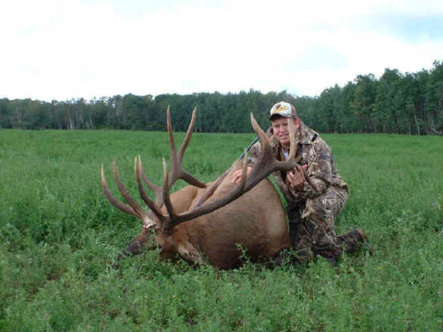 Will McElrath from Texas with trophy elk at Echo Lake Hunts in Saskatchewan