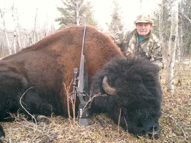 Allan Mulley from Maine with trophy bison at Echo Lake Hunts in Saskatchewan