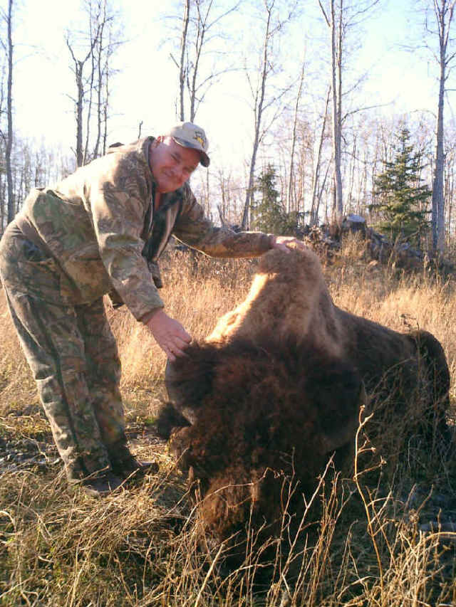 Clyde Barney from Arizona with trophy bison at Echo Lake Hunts in Saskatchewan