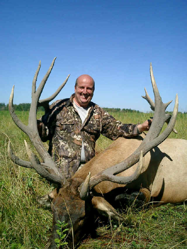 George Tunal from Texas with trophy elk at Echo Lake Hunts in Saskatchewan
