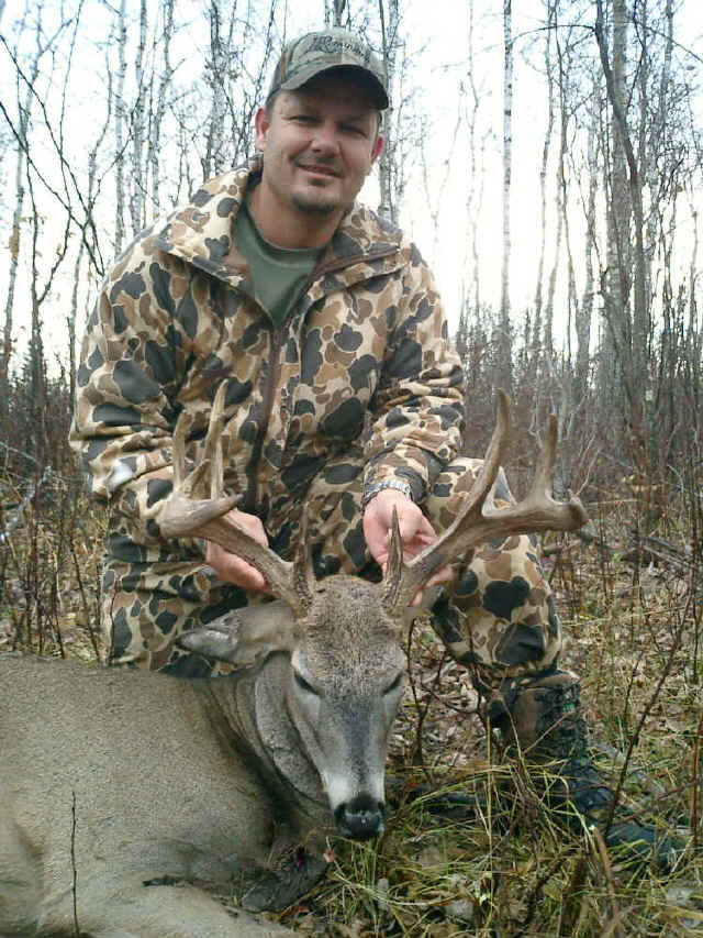 Jeff Morgenroth from Texas with trophy whitetail at Echo Lake Hunts in Saskatchewan