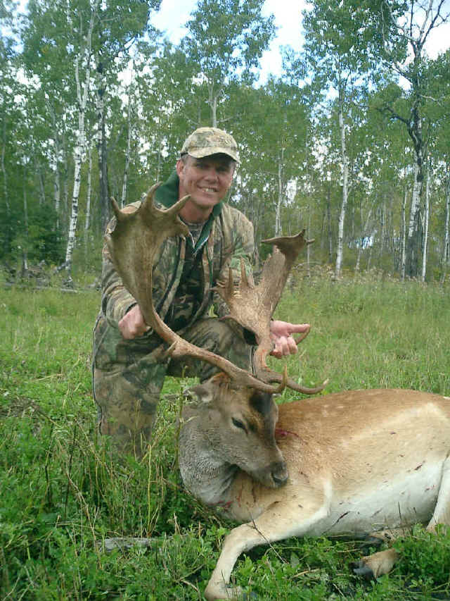 Randy Herrin from Arizona with trophy reindeer at Echo Lake Hunts in Saskatchewan
