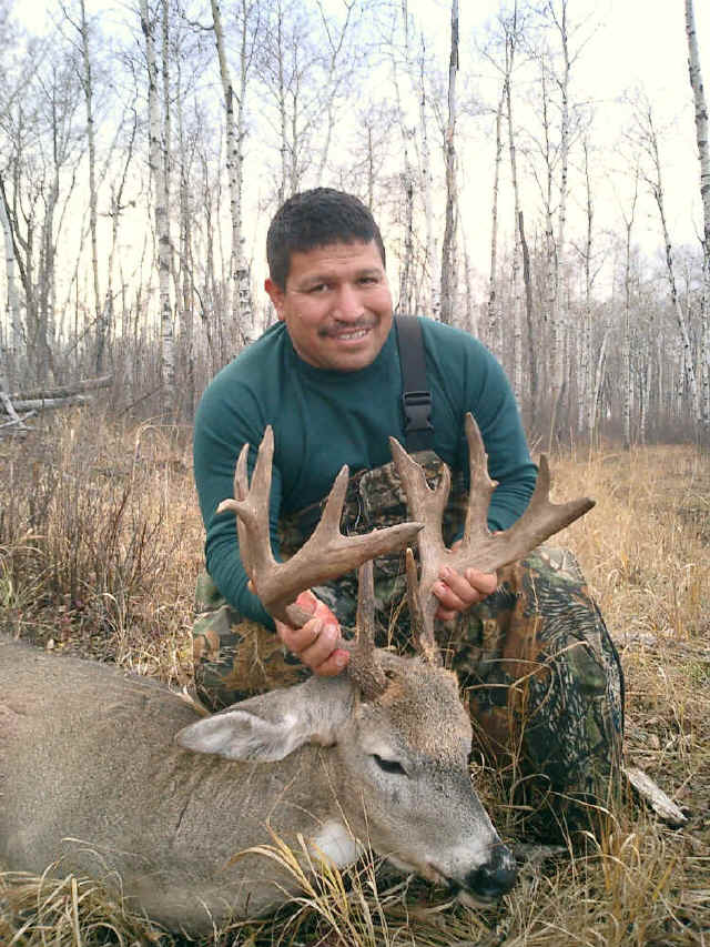 Robert from Texas with trophy whitetail at Echo Lake Hunts in Saskatchewan