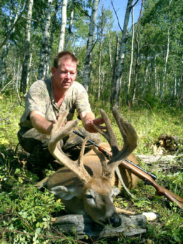 Roger Roulette from Texas with trophy whitetail at Echo Lake Hunts in Saskatchewan