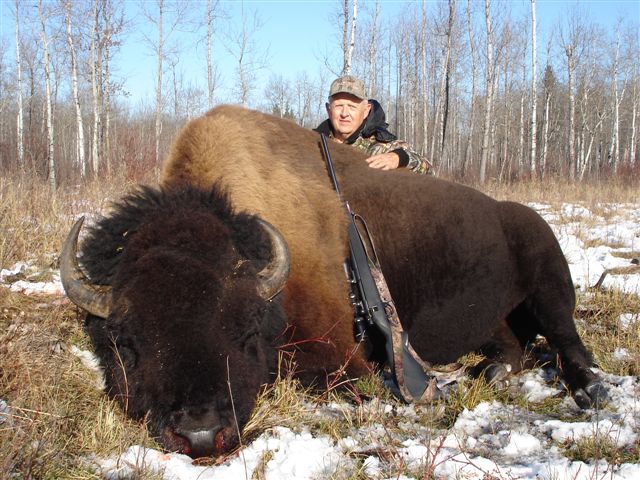 Charles Butler from New Mexico with trophy bison at Echo Lake Hunts in Saskatchewan