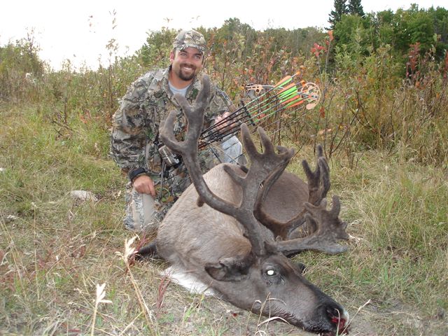 Heath Miller from Utah with trophy reindeer at Echo Lake Hunts in Saskatchewan