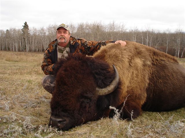 Larry Watley from Texas with trophy bison at Echo Lake Hunts in Saskatchewan