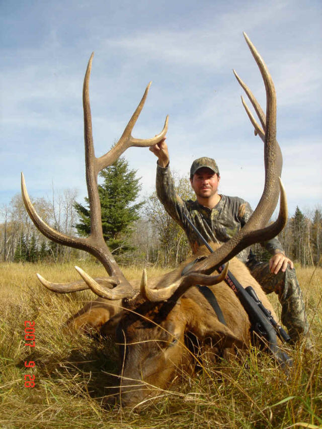 Carlos Cardenas from Mexico with trophy bull elk at Echo Lake Hunts in Saskatchewan