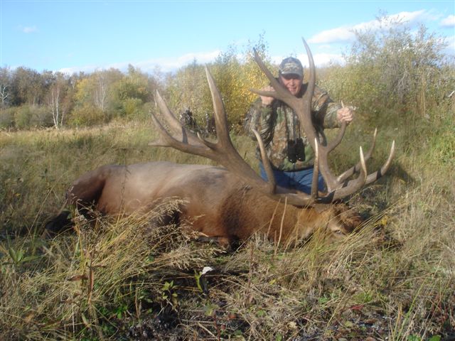 James Thomas from Washington with trophy bull elk at Echo Lake Hunts in Saskatchewan