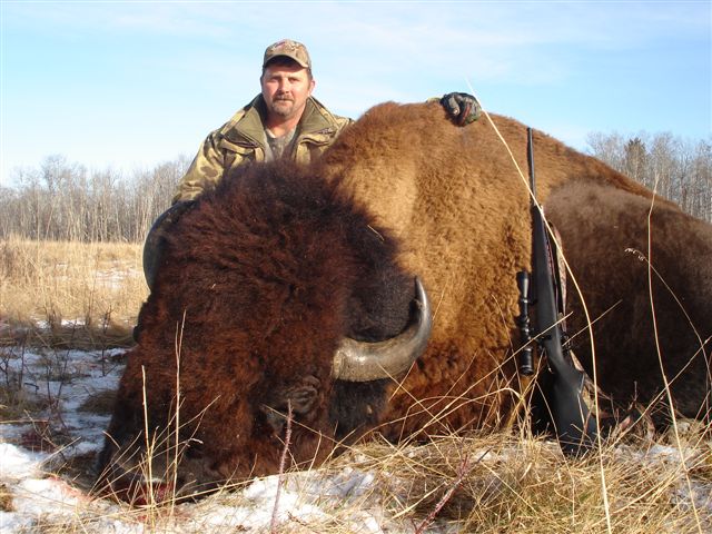 Kevin Preiss from Texas with trophy bison at Echo Lake Hunts in Saskatchewan