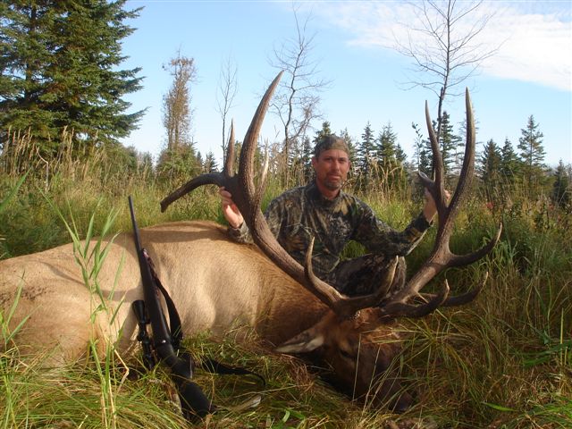 Mark Hanks from Texas with trophy bull elk at Echo Lake Hunts in Saskatchewan