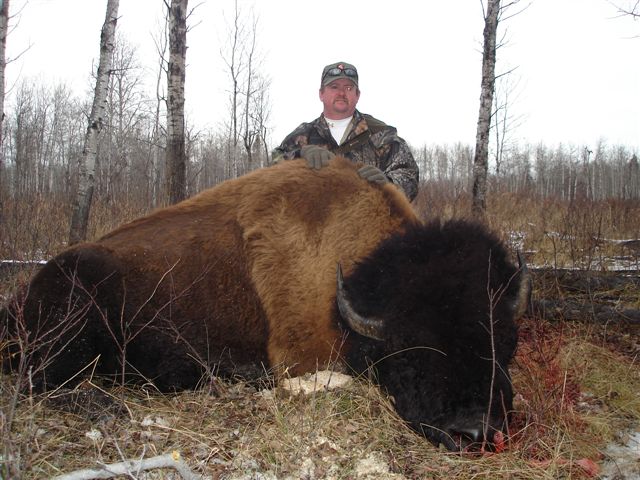 Mitchell Brown from Texas with trophy bison at Echo Lake Hunts in Saskatchewan