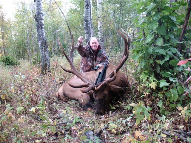 Bill Joyce from Connecticut with trophy bull elk at Echo Lake Hunts in Saskatchewan