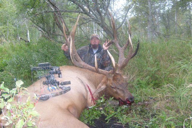 Chris Dowland from Arizona with trophy bull elk at Echo Lake Hunts in Saskatchewan