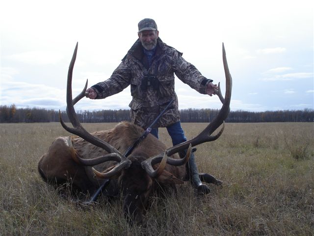 Doug Marshall from Utah with trophy bull elk at Echo Lake Hunts in Saskatchewan