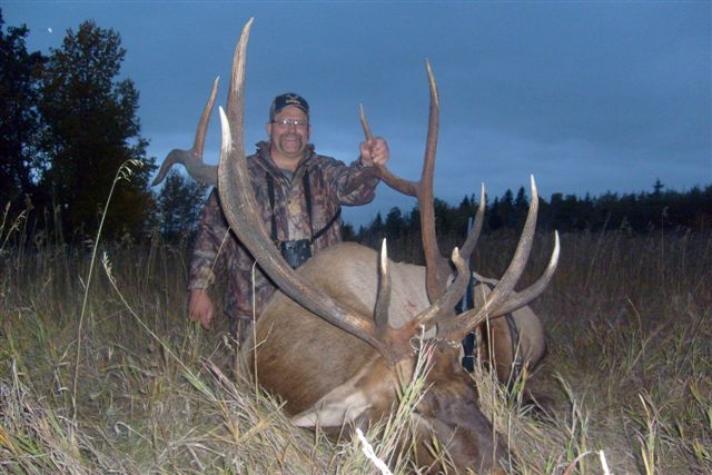 Frank Page from North Carolina with trophy bull elk at Echo Lake Hunts in Saskatchewan