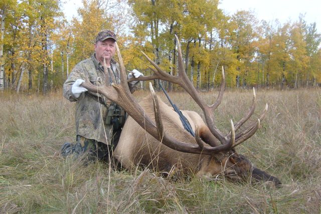 Ken Martin from Texas with trophy bull elk at Echo Lake Hunts in Saskatchewan