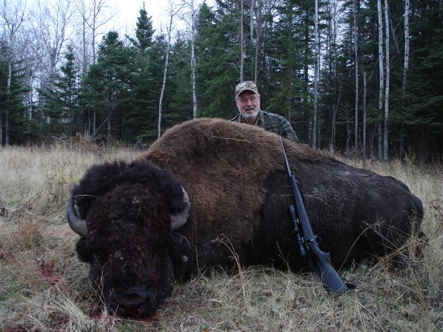 Richard Sheppler from Tennessee with trophy bison at Echo Lake Hunts in Saskatchewan