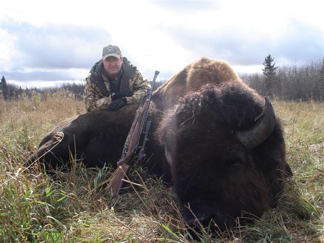 Robert Kneppler from Texas with trophy bison at Echo Lake Hunts in Saskatchewan
