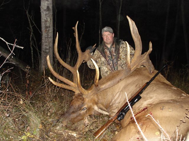 Robert Kneppler from Texas with trophy bull elk at Echo Lake Hunts in Saskatchewan
