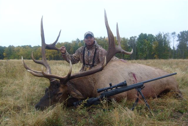 Ross Antolin from Hawaii with trophy bull elk at Echo Lake Hunts in Saskatchewan