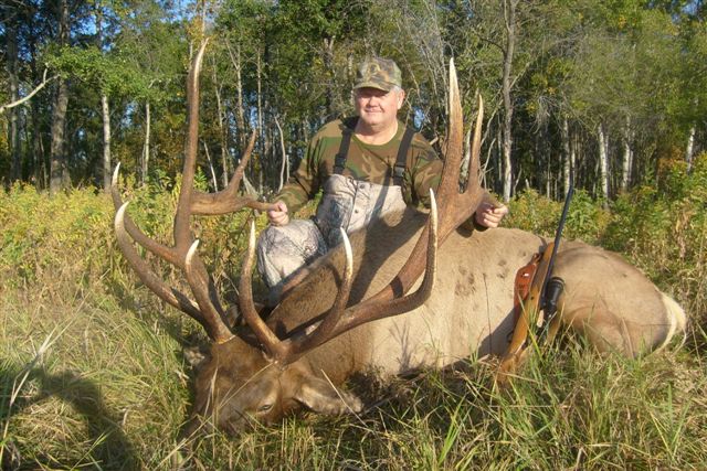 Wayne Daigle from Texas with trophy bull elk at Echo Lake Hunts in Saskatchewan